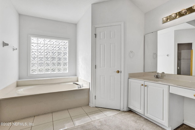 809 Lotus Ln N, Fruit Cove, FL 32259 - bathroom with vanity, a bath, and tile patterned floors