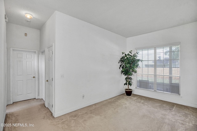 809 Lotus Ln N, Fruit Cove, FL 32259 - carpeted empty room with baseboards
