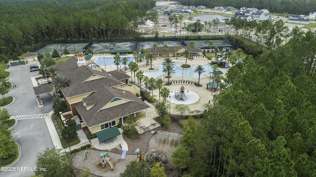 809 Lotus Ln N, Fruit Cove, FL 32259 - aerial view of property's location featuring a heavily wooded area, a pool, and a large body of water