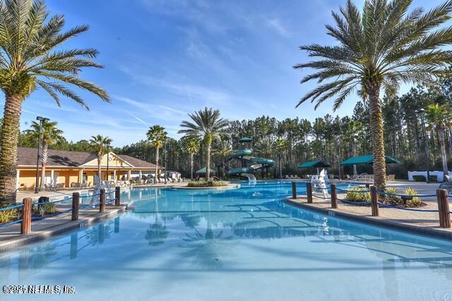 809 Lotus Ln N, Fruit Cove, FL 32259 - community pool with a water slide