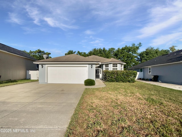 3020 Southbank Cir, Green Cove Springs, FL 32043 - ranch-style house featuring driveway, a front yard, a garage, and stucco siding