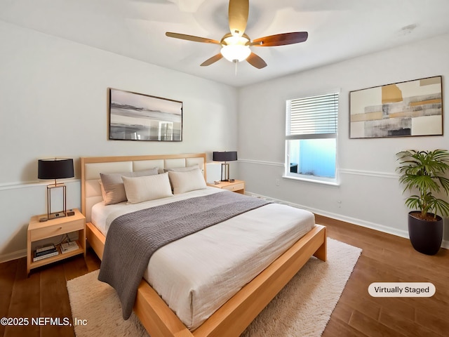 3020 Southbank Cir, Green Cove Springs, FL 32043 - bedroom featuring wood finished floors, baseboards, and a ceiling fan