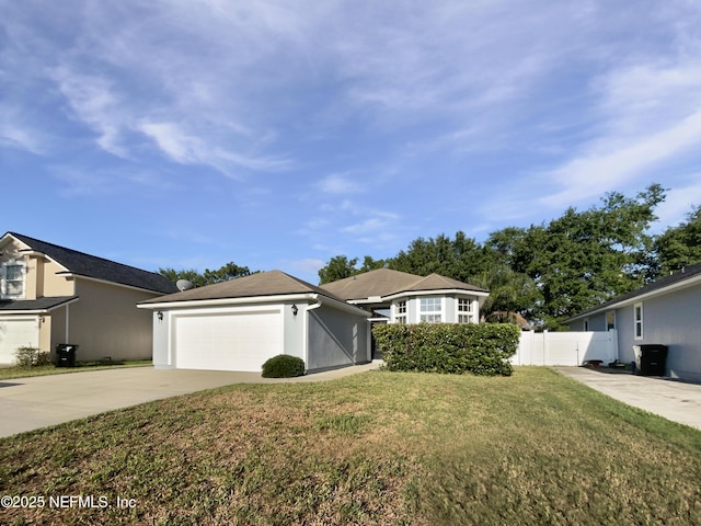 3020 Southbank Cir, Green Cove Springs, FL 32043 - view of front of home featuring concrete driveway, an attached garage, and stucco siding