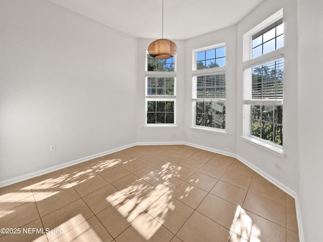 3020 Southbank Cir, Green Cove Springs, FL 32043 - unfurnished dining area with tile patterned flooring and baseboards