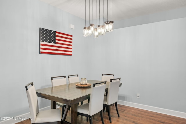 1770 High Brook Ct, Jacksonville, FL 32225 - dining area featuring wood finished floors, a chandelier, and baseboards