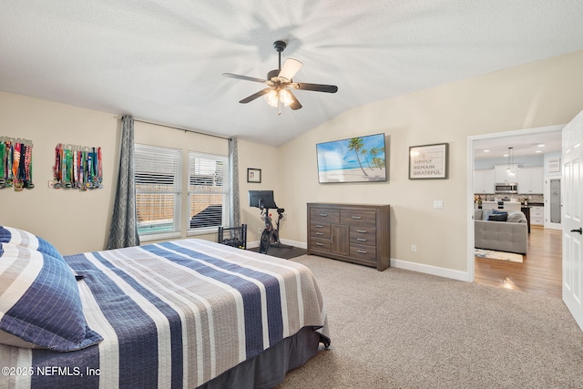 1770 High Brook Ct, Jacksonville, FL 32225 - bedroom with lofted ceiling, light carpet, baseboards, and a ceiling fan