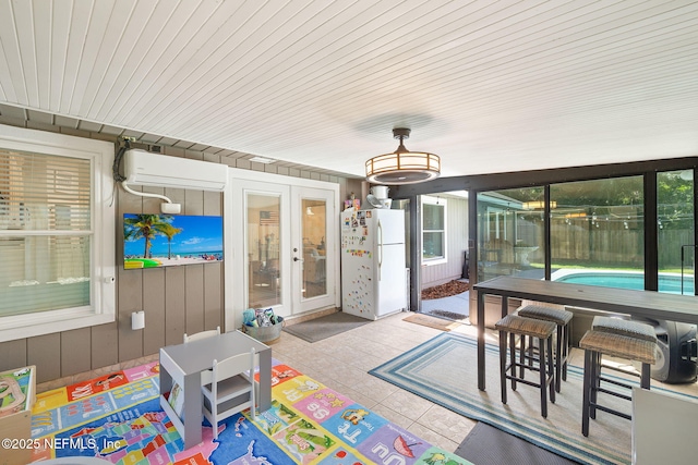 1770 High Brook Ct, Jacksonville, FL 32225 - sunroom featuring french doors and a wall unit AC