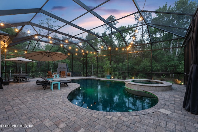 135 Tate Ln, Saint Johns, FL 32259 - view of pool featuring a fireplace, a patio area, a pool with connected hot tub, and a lanai