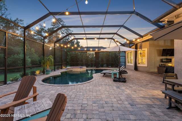 135 Tate Ln, Saint Johns, FL 32259 - view of pool featuring a patio, glass enclosure, and a pool with connected hot tub