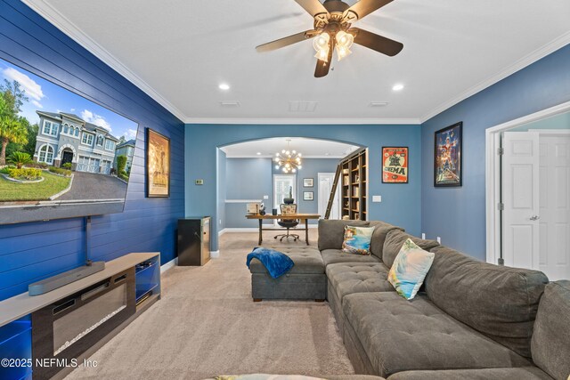 135 Tate Ln, Saint Johns, FL 32259 - living room with arched walkways, ornamental molding, recessed lighting, carpet floors, and baseboards