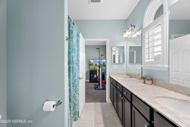 135 Tate Ln, Saint Johns, FL 32259 - full bath featuring double vanity and tile patterned flooring