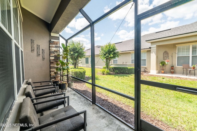 sunroom featuring healthy amount of natural light