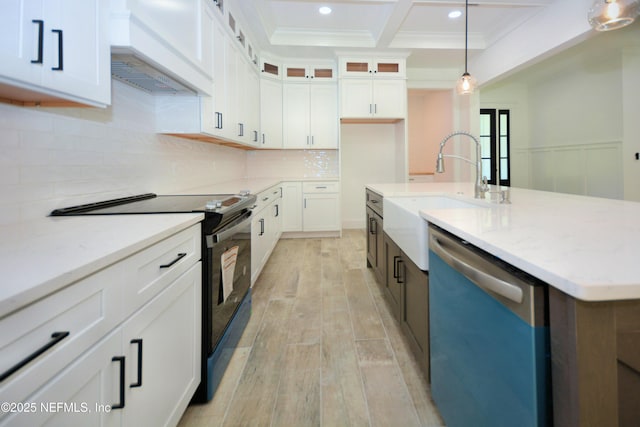95121 N Ellis Landing Rd, Fernandina Beach, FL 32034 - kitchen with dishwashing machine, black electric range, premium range hood, a sink, and light wood-style floors