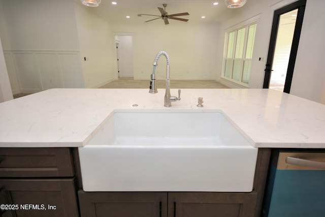 95121 N Ellis Landing Rd, Fernandina Beach, FL 32034 - kitchen featuring a sink, dishwasher, recessed lighting, light stone counters, and a ceiling fan