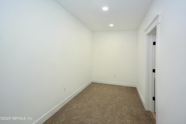 95121 N Ellis Landing Rd, Fernandina Beach, FL 32034 - empty room featuring light colored carpet, baseboards, and recessed lighting