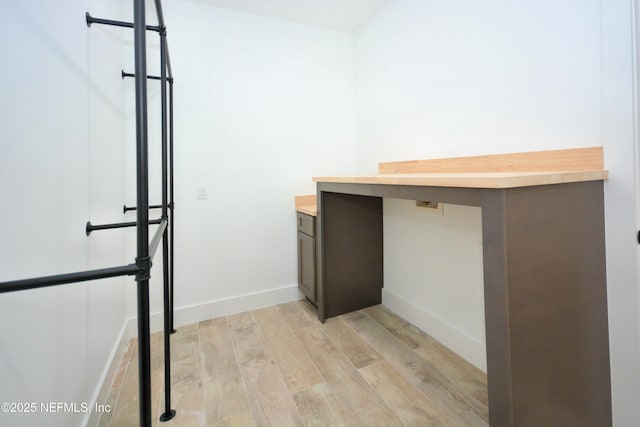 95121 N Ellis Landing Rd, Fernandina Beach, FL 32034 - unfurnished office with light wood-style flooring and baseboards