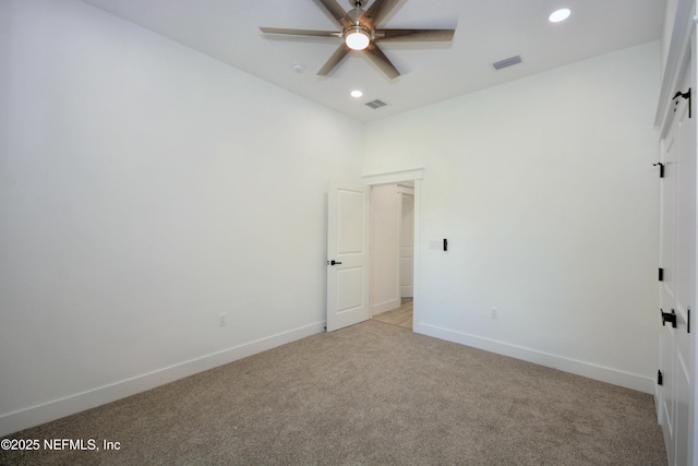 95121 N Ellis Landing Rd, Fernandina Beach, FL 32034 - unfurnished room featuring light carpet, a ceiling fan, recessed lighting, and baseboards
