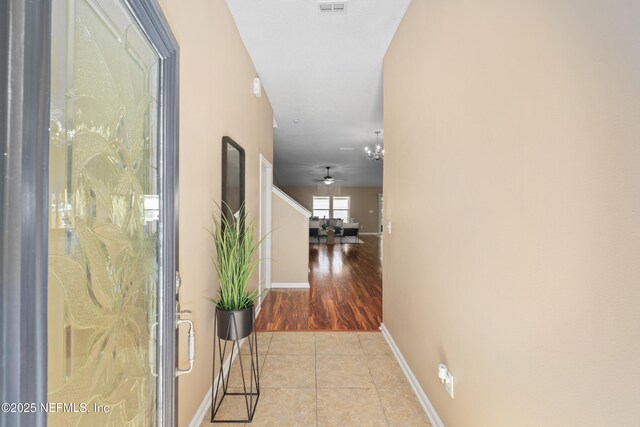 467 S Aberdeenshire Dr, Saint Johns, FL 32259 - hallway with light tile patterned flooring and baseboards
