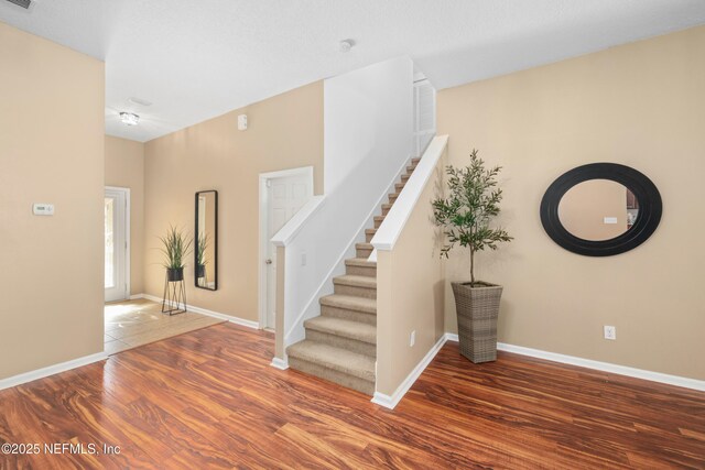 467 S Aberdeenshire Dr, Saint Johns, FL 32259 - staircase featuring wood finished floors and baseboards