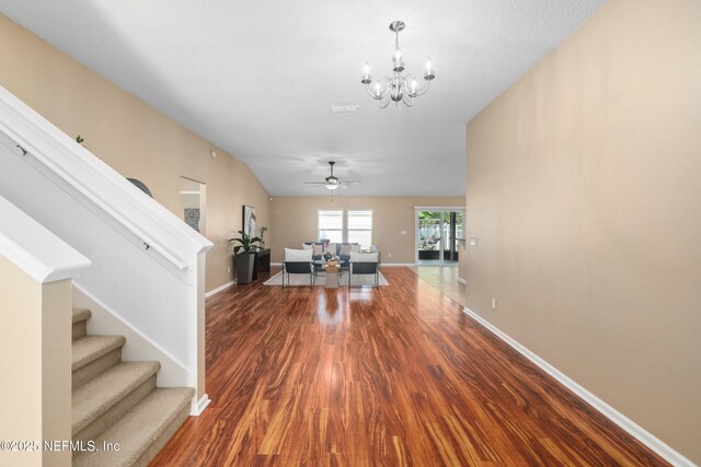 467 S Aberdeenshire Dr, Saint Johns, FL 32259 - living room with wood finished floors, a chandelier, stairs, and baseboards