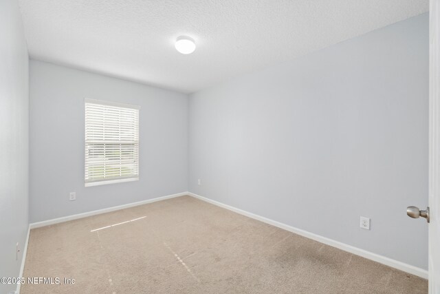 467 S Aberdeenshire Dr, Saint Johns, FL 32259 - carpeted empty room featuring baseboards and a textured ceiling
