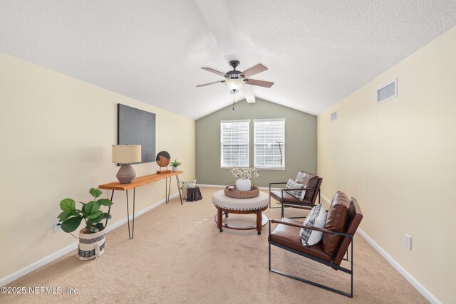 467 S Aberdeenshire Dr, Saint Johns, FL 32259 - living area with ceiling fan, vaulted ceiling, carpet floors, baseboards, and a textured ceiling