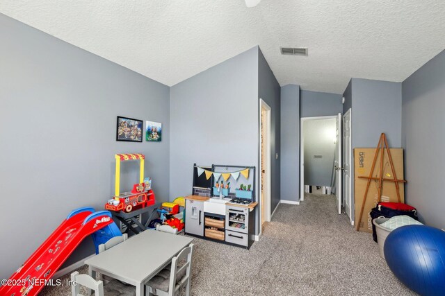 3100 Hickory Glen Dr, Orange Park, FL 32065 - playroom featuring carpet and a textured ceiling
