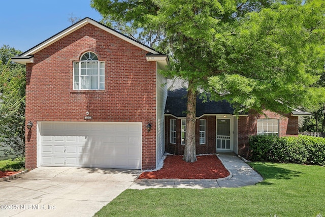3100 Hickory Glen Dr, Orange Park, FL 32065 - traditional-style house with an attached garage, brick siding, and concrete driveway