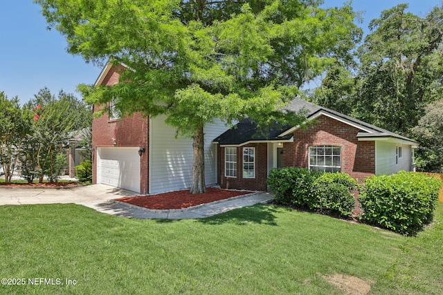 3100 Hickory Glen Dr, Orange Park, FL 32065 - traditional-style house featuring brick siding, driveway, a front lawn, and a garage