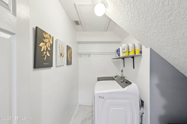 3100 Hickory Glen Dr, Orange Park, FL 32065 - clothes washing area featuring independent washer and dryer, light marble finish floors, baseboards, and a textured ceiling