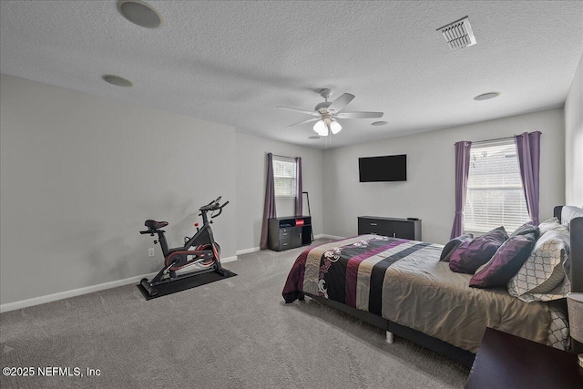 8719 Derry Dr, Jacksonville, FL 32244 - bedroom with carpet floors, baseboards, a textured ceiling, and ceiling fan
