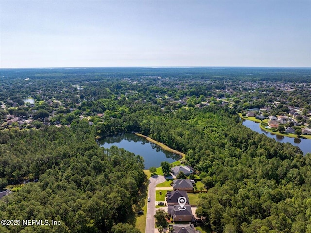 8719 Derry Dr, Jacksonville, FL 32244 - drone / aerial view of a heavily wooded area and a large body of water