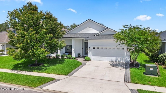 2035 Arden Forest Pl, Fleming Island, FL 32003 - single story home featuring a garage, concrete driveway, a front yard, and a shingled roof