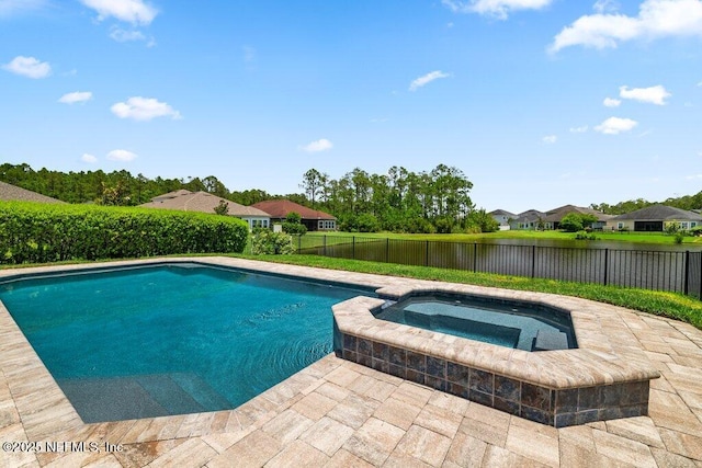 2035 Arden Forest Pl, Fleming Island, FL 32003 - view of pool with fence, a water view, a residential view, and a pool with connected hot tub