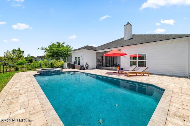 2035 Arden Forest Pl, Fleming Island, FL 32003 - view of pool with a patio, fence, and a pool with connected hot tub