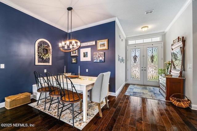 2035 Arden Forest Pl, Fleming Island, FL 32003 - dining area with wood-type flooring, baseboards, a chandelier, and crown molding