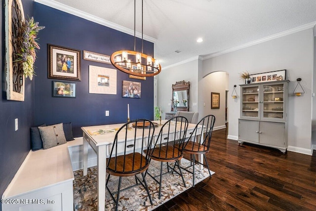 2035 Arden Forest Pl, Fleming Island, FL 32003 - dining room featuring arched walkways, hardwood / wood-style flooring, ornamental molding, baseboards, and recessed lighting