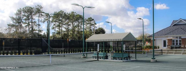 2035 Arden Forest Pl, Fleming Island, FL 32003 - view of tennis court with fence