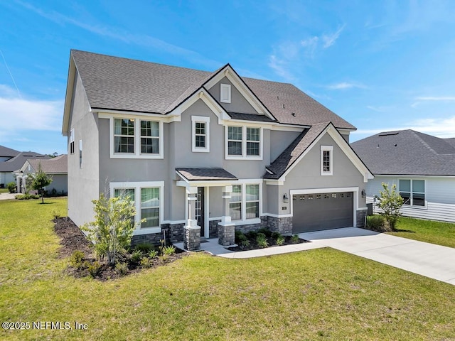 23 Catesby Ln, Saint Augustine, FL 32095 - view of front facade featuring concrete driveway, stone siding, a shingled roof, and a front yard