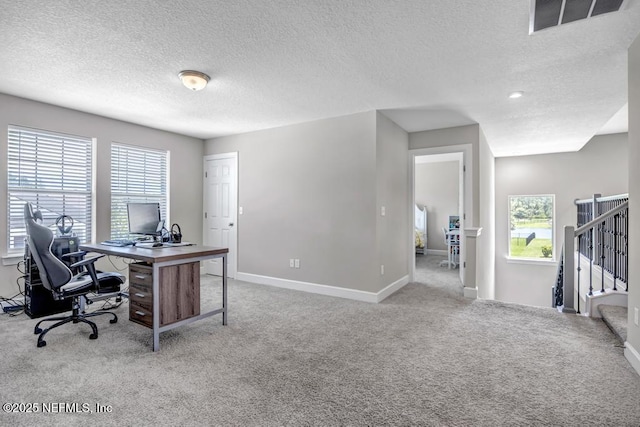 23 Catesby Ln, Saint Augustine, FL 32095 - carpeted office space featuring a textured ceiling and baseboards