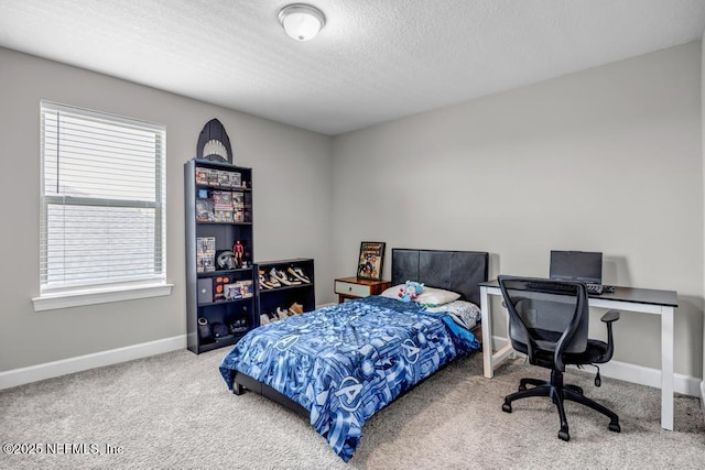 23 Catesby Ln, Saint Augustine, FL 32095 - bedroom with carpet flooring, baseboards, and a textured ceiling