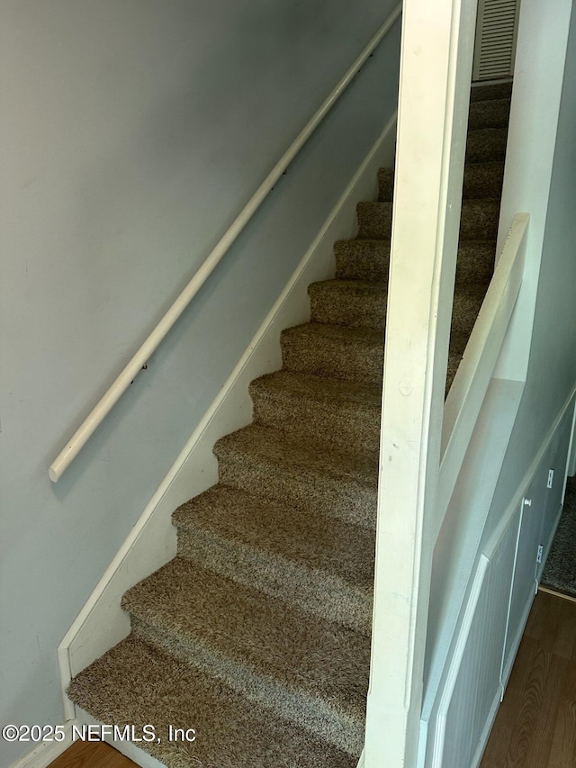 3801 Crown Point Rd Unit 1033, Jacksonville, FL 32257 - staircase with wood finished floors