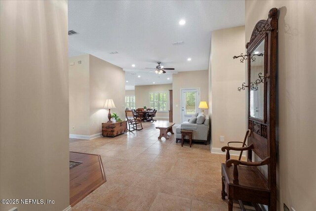 207 Towers Ranch Dr, Saint Augustine, FL 32092 - hallway with baseboards, light tile patterned flooring, and recessed lighting