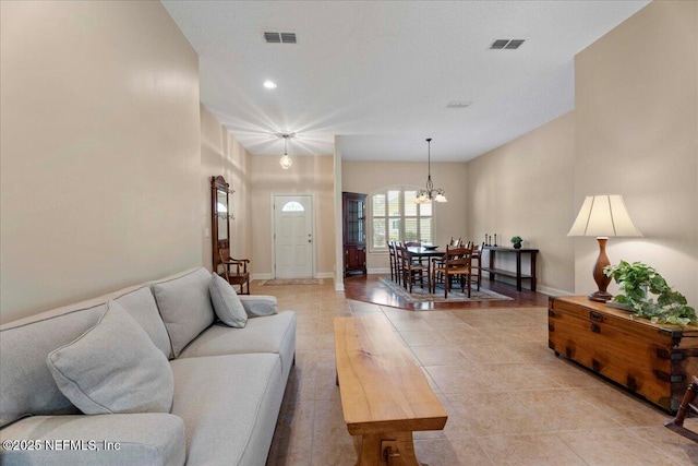 207 Towers Ranch Dr, Saint Augustine, FL 32092 - living room featuring a chandelier, light tile patterned floors, recessed lighting, and baseboards
