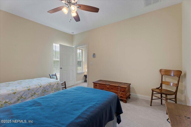 207 Towers Ranch Dr, Saint Augustine, FL 32092 - bedroom with light colored carpet, baseboards, and ceiling fan