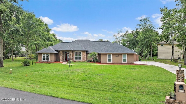 1476 Mallard Landing Blvd, Saint Johns, FL 32259 - view of front of home with concrete driveway and a front lawn