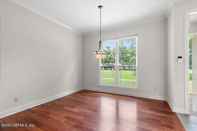 1476 Mallard Landing Blvd, Saint Johns, FL 32259 - unfurnished dining area with dark wood-style flooring, crown molding, and baseboards