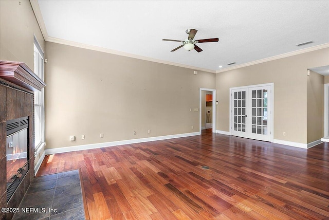 1476 Mallard Landing Blvd, Saint Johns, FL 32259 - unfurnished living room featuring a ceiling fan, a fireplace, wood finished floors, ornamental molding, and baseboards