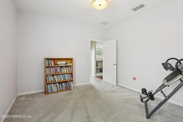 1867 Paradise Moorings Blvd, Middleburg, FL 32068 - workout area with carpet flooring and baseboards