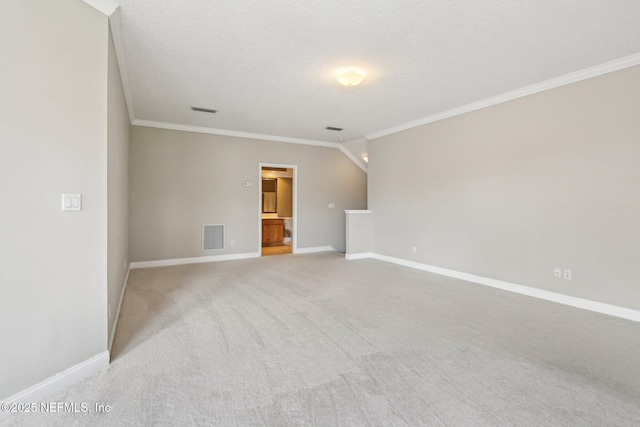 1867 Paradise Moorings Blvd, Middleburg, FL 32068 - unfurnished room with crown molding, light carpet, baseboards, and a textured ceiling